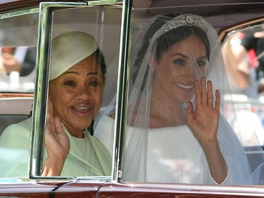 Meghan Markle (R) and her mother, Doria Ragland, arrive for her wedding ceremony to marry Britain's Prince Harry, Duke of Sussex, at St George's Chapel, Windsor Castle, in Windsor, on May 19, 2018.