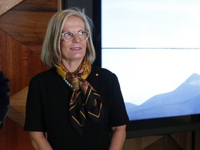 In this April 24, 2018, file photo, Lucy Turnbull, wife of Australian Prime Minister Malcolm Turnbull, visits the Sir John Monash Centre on the eve of ANZAC (Australian and New Zealand Army Corps) Day ceremonies in Villiers-Bretonneux, northern France. French President Emmanuel Macron raised eyebrows in Sydney on Wednesday, May 2, 2018, by calling Lucy "delicious." The comment quickly sparked lighthearted reaction on social media and in the Australian press, amid lively conjecture about the French leader's intent.