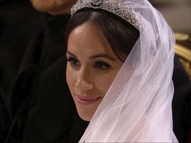 In this frame from video, Meghan Markle listens during her wedding ceremony with Britain's Prince Harry at St. George's Chapel in Windsor Castle in Windsor, near London, England, Saturday, May 19, 2018.