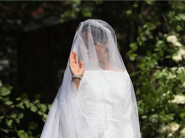 Meghan Markle arrives for her wedding ceremony to Prince Harry at St. George's Chapel in Windsor Castle in Windsor, near London, England, Saturday, May 19, 2018.