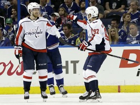 Lars Eller, left, celebrates his goal against the Lightning with Washington Capitals teammate Evgeny Kuznetsov during Game 1 of the Eastern Conference final on Friday night in Tampa, Fla.