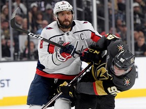 Tomas Nosek of the Vegas Golden Knights is checked by Alex Ovechkin of the Washington Capitals at T-Mobile Arena on May 30, 2018 in Las Vegas. (Harry How/Getty Images)