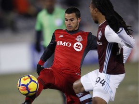 Toronto FC's Sebastian Giovinco, left.