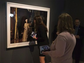 A photo of Queen Elizabeth is viewed as a collection of artwork by famed American photographer Annie Leibovitz is donated to the Art Gallery of Nova Scotia in Halifax on Thursday, June 6, 2013. The Nova Scotia government is reviving hopes that a collection of iconic portraits by famed American photographer Annie Leibovitz could be displayed at a Halifax gallery.