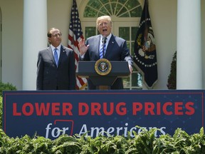 President Donald Trump speaks during an event about prescription drug prices with Health and Human Services Secretary Alex Azar in the Rose Garden of the White House in Washington, Friday, May 11, 2018.