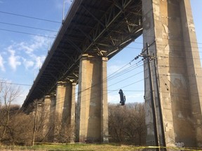 A car hangs from the Millwood bridge on Wednesday, May 2, 2018. (twitter.com/kawarthaNOW)