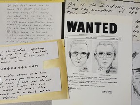 A San Francisco Police Department wanted bulletin and copies of letters sent to the San Francisco Chronicle by a man who called himself Zodiac are displayed Thursday, May 3, 2018, in San Francisco. Detectives in Northern California are trying to get a DNA profile on the Zodiac Killer to track him down using the same family-tree tracing technology investigators used in the Golden State Killer case. Vallejo police Detective Terry Poyser tells the Sacramento Bee his agency has recently submitted two envelopes that contained letters from the Zodiac Killer for DNA analysis. The Zodiac Killer stabbed or shot to death five people in Northern California in 1968 and 1969. He was dubbed the Zodiac Killer after he sent taunting letters and cryptograms to police and newspapers that included astrological symbols.