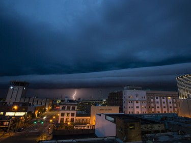 Lightning strikes Monday, May 14, 2018 west of downtown South Bend as a storm rolled through the area. (Michael Caterina/South Bend Tribune via AP) ORG XMIT: INSBE102