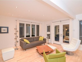 The living room is one of the homeowners’ favourite rooms of the renovated home because of the afternoon sun that streams into the space. It’s bright and modern, and flows seamlessly into the other rooms.