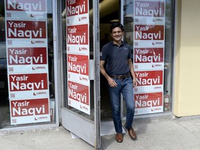 Ottawa Centre Liberal candidate Yasir Naqvi walks out the door of his campaign office in Ottawa on Thursday, May 24, 2018. Yasir Naqvi is running for re-election in what's widely considered a Liberal safe seat, but he says he's never seen so much uncertainty among voters at the door who tell him they're still weighing their options.