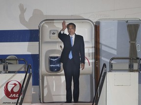 Chinese Premier Li Keqiang arrives at the Haneda international airport in Tokyo, Tuesday, May 8, 2018. Li is on a four-day visit to Japan.