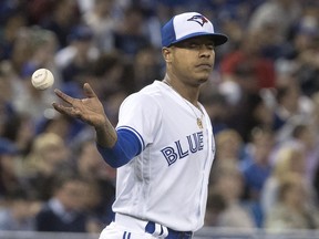 Toronto Blue Jays starting pitcher Marcus Stroman takes the ball from his catcher in fifth-inning action against the Seattle Mariners in Toronto on Tuesday May 8, 2018. (THE CANADIAN PRESS/PHOTO)