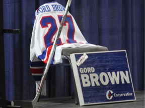 MP Gord Brown's hockey stick and jersey  at his funeral in Gananoque on Thursday May 10  2018. Ian MacAlpine/The Whig-Standard/Postmedia Network ORG XMIT: wW7zENPEgXqLeTFG_wN3