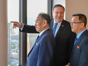 Secretary of State Mike Pompeo points out New York landmarks, including the U.N. headquarters and the Freedom Tower, to North Korean official Kim Yong Chol on Wednesday. MUST CREDIT: Department of State