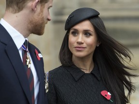 FILE - In this April 25, 2018 file photo, Britain's Prince Harry and Meghan Markle attend a Service of Thanksgiving and Commemoration on ANZAC Day at Westminster Abbey in London. The couple will wed on May 19.