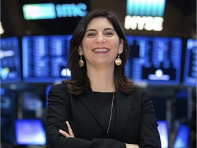 In this undated photo provided by the New York Stock Exchange, Stacey Cunningham poses for a photo at the Stock Exchange in New York. Cunningham, the chief operating officer for the NYSE group, will become the 67th president of the Big Board.