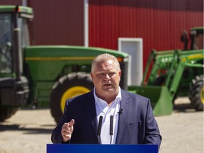 Ontario PC leader Doug Ford makes an announcement during a campaign stop on a farm in the town of Lakeshore, Ont. on Wednesday, May 23, 2018.