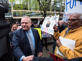 Ontario Progressive Conservative leader Doug Ford holds a rally to speak about Hydro One in Toronto on Tuesday, May 15, 2018.