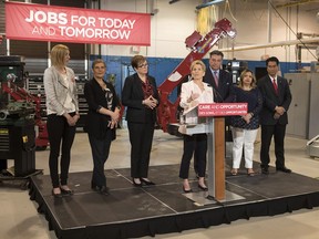 Ontario Liberal Leader Kathleen Wynne assails the New Democratic Party's platform at the Finishing Trades Institute of Ontario in Toronto on Monday, May 14, 2018.