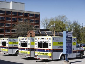 Ambulances lined up to offload patients into the ER at the Civic Hospital in Ottawa Thursday May 17, 2018.