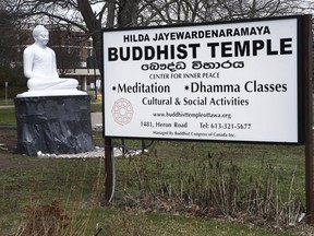 The restored Buddha statue sits at the Hilda Jayewardenaramaya Buddhist Temple in Ottawa Monday in late April 2018.