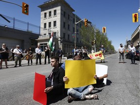 Around 50 or so protesters gathered beside the U.S. Embassy in Ottawa Monday May 14, 2018. The protesters were upset that the US embassy opened in Jerusalem on Monday.  Tony Caldwell