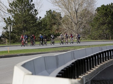 One of the lead packs of cyclists speed along the Sir John A. Macdonald Parkway. Hundreds of cyclists and walkers of all ages and ability took part in the CN Cycle for CHEO fundraiser on Sunday morning in Ottawa on May 6, 2018.
