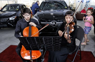 Ethan Allers and Sarah Williams of the Ottawa Symphony Orchestra played for the Benzfest guests.