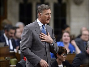 Conservative MP Maxime Bernier rises during Question Period in the House of Commons on Parliament Hill in Ottawa on Thursday, April 19, 2018.