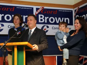 Gord Brown celebrates the result of the 2015 federal election with his family. Postmedia Network file photo