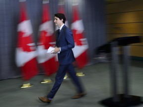 Prime Minister Justin Trudeau leaves after holding a press conference in New York on Thursday, May 17, 2018.
