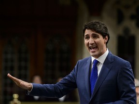 Prime Minister Justin Trudeau stands during question period in the House of Commons on Parliament Hill in Ottawa on Wednesday, May 30, 2018. The prime minister has been cornered by his own over-zealous regulatory changes — enthusiasm that shut down the Northern Gateway and Energy East options.