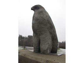 Facebook picture of concrete falcon apparently stolen from its perch George Dunbar Bridge.