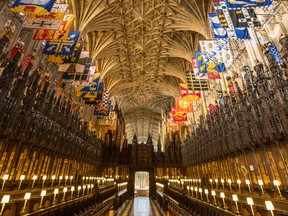 In this file photo taken on February 11, 2018 A general view shows the choir in St George's Chapel at Windsor Castle, west of London, on February 11, 2018 where Britain's Prince Harry and US actress Meghan Markle will hold their wedding ceremony. Britain's Prince Harry and US actress Meghan Markle will marry on May 19 at St George's Chapel in Windsor Castle.