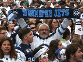 A fan shows his loyalty during the Whiteout Street Party outside Bell MTS Centre in Winnipeg on Fri., April 20, 2018.