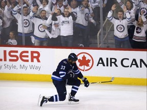 Winnipeg Jets defenceman Dustin Byfuglien celebrates his goal against the Nashville Predators during Game 2 of their second-round playoff series in Winnipeg on Tues., May 1, 2018.
