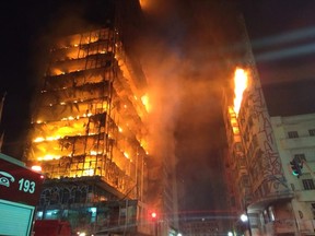A burning building in downtown Sao Paulo has collapsed as firefighters worked to put out a fire that began in the middle of the night.