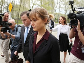 Allison Mack departs the United States Eastern District Court after a bail hearing in relation to the sex trafficking charges filed against her on May 4, 2018.