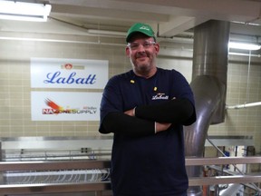 Scott Baldwin of St. Thomas stands in the Labatt Brewery's brewhouse. Baldwin discovered a way to save 15 million litres of water annually with a few slight changes to the brewing process. (SHANNON COULTER, The London Free Press)