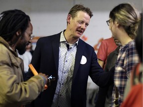 Joel Harden of the NDP celebrated his victory over longtime Ottawa Centre riding Liberal incumbent Yasir Naqvi with supporters at Makerspace North in Ottawa on June 7, 2018.