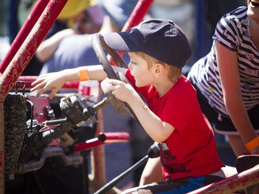 Four and a half-year-old James Beck sits in a jeep at the Touch A Truck event that took place at Lincoln Fields Shopping Centre Sunday June 10, 2018.