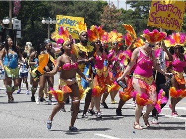 People take part in the Carivibe parade in Ottawa on Saturday, June 16, 2018.   (Patrick Doyle)  ORG XMIT: 0617 Carivibe 07