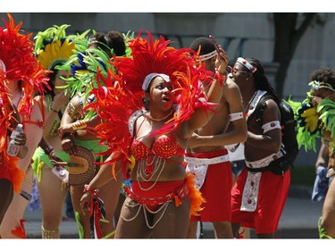 People take part in the Carivibe parade in Ottawa on Saturday, June 16, 2018.   (Patrick Doyle)  ORG XMIT: 0617 Carivibe 21
