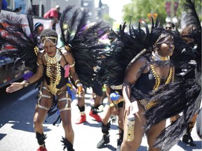 People take part in the Carivibe parade in Ottawa on Saturday, June 16, 2018.