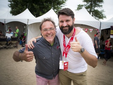 The 25th annual Tim Hortons Ottawa Dragon Boat Festival continued at Mooney's Bay Park on Saturday, June 23, 2018. One of the original founders of the festival, Warren Creates, and Craig Stewart, chair of the festival.