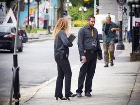 Members of the Ottawa police criminal investigation unit were in front of some York Street bars Saturday morning after a stabbing took place over night.   Ashley Fraser/Postmedia