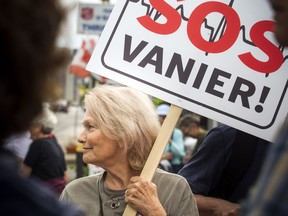 Residents opposed to the Salvation Army's plans for a new shelter and facility in Vanier took their message to the streets, marching through their community Sunday June 24, 2018. L-R Clodie Paris who lives nearby, say "its our village" and wanted to come out to support.