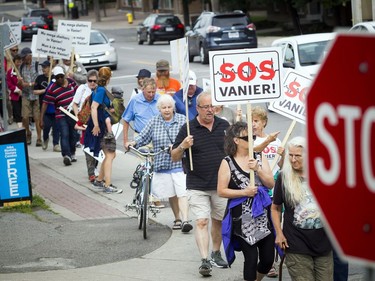 Residents opposed to the Salvation Army's plans for a new shelter and facility in Vanier took their message to the streets, marching through their community Sunday June 24, 2018.   Ashley Fraser/Postmedia