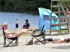 A blue-green algae bloom has closed beaches at Lac Philippe.