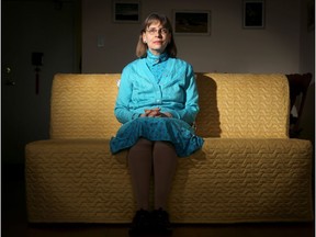 Nicole Woinarosky, 64, sits ramrod straight in her Ottawa apartment. She suffers from a rare and painful disease, Ehlers-Dalos, that causes her joints to frequently dislocate.